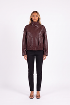 Cropped faux leather bomber with funnel collar in Burgundy — front